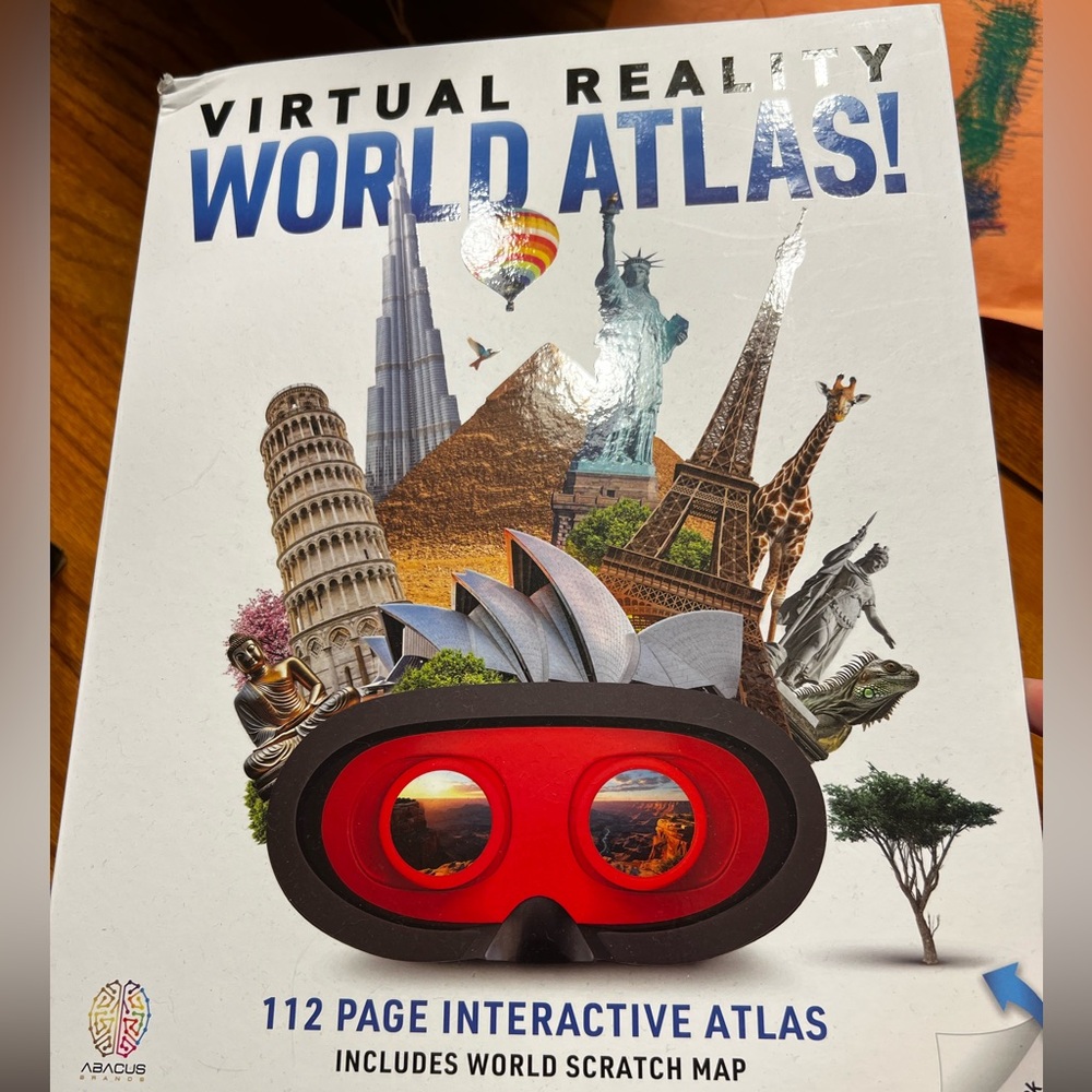 Virtual Reality World Atlas with Red VR Goggles